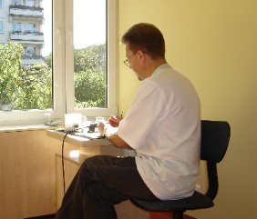 Head of NZOZ, Krzysztof Wochacz working at his office.